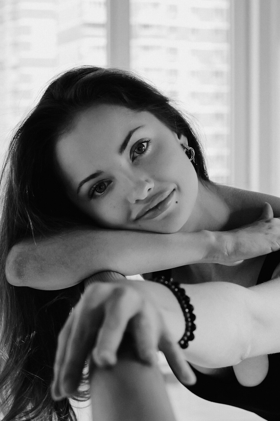 Portrait of a smiling woman with dark hair