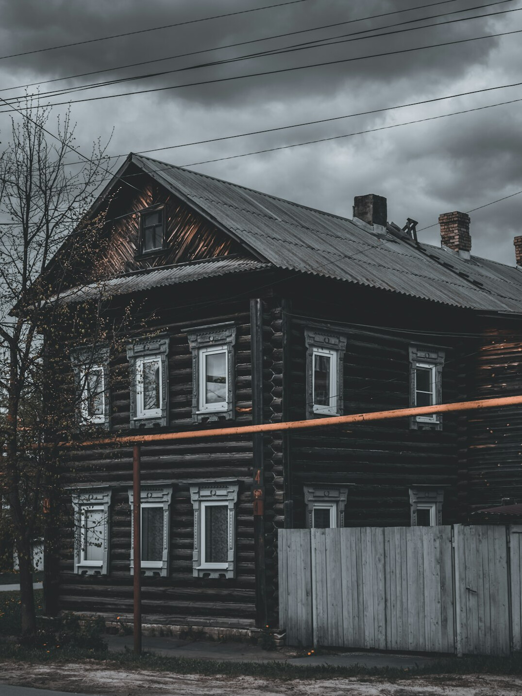 detective investigating old house