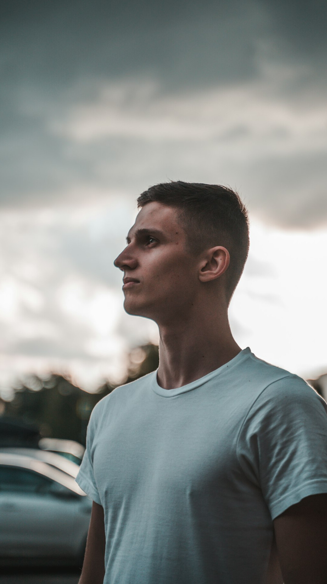 Portrait of a young man in a light shirt